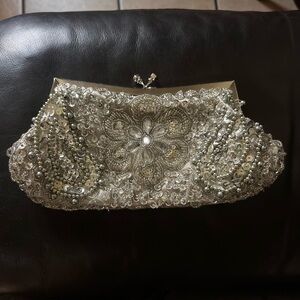 Elegant Silver Clutch with Beaded Design